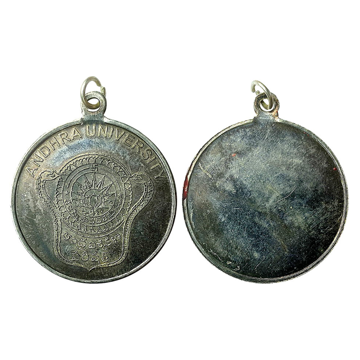 Andhra University, Silver Medal, 20 g. Obv: Emblem of the University and legend around, Re