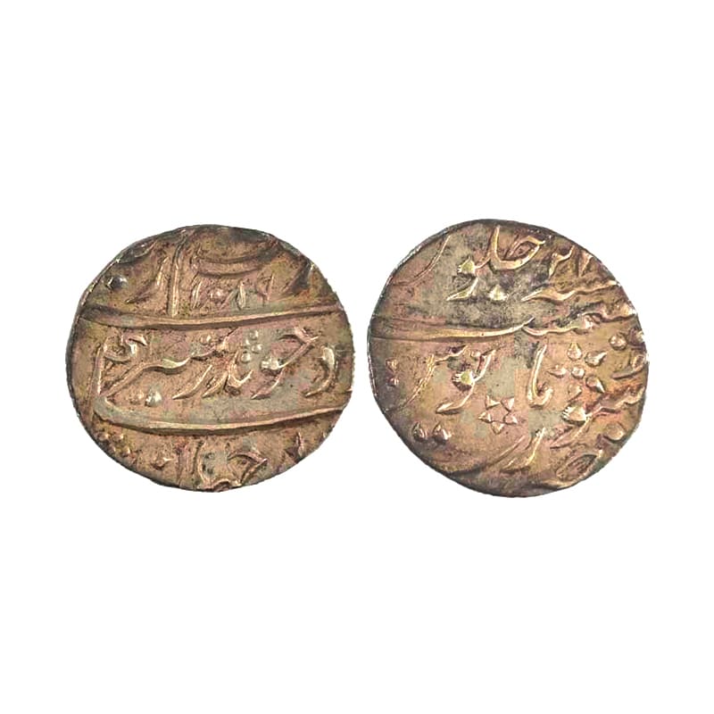 Aurangzeb, ½ Rupee, Surat Mint, Silver, Badr Munir type. Mint name in the elongated form a