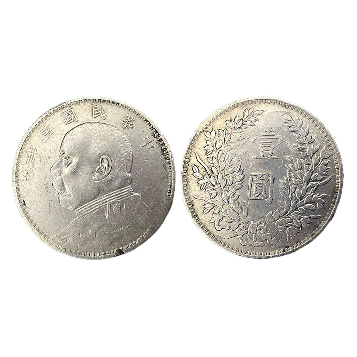 China, Fat Man Dollar. Silver, 26.36 g. Bust of the emperor to left and Chinese legend at 